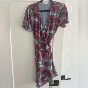 Beautiful Babaton wrap dress. Fits medium and large. Gently used